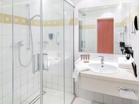 Shower, eco-friendly toiletries, hair dryer, towels