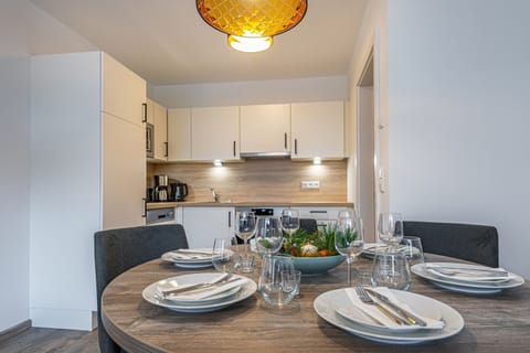 Comfort-Apartment, 2 Bedrooms | Private kitchen | Fridge, oven, stovetop, highchair