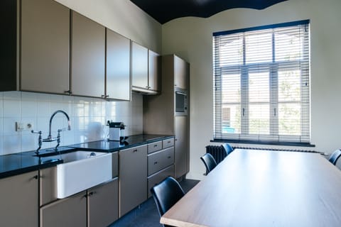 Comfort Apartment (Vrede) | Private kitchen | Espresso maker, highchair