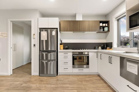 Two Bedroom Deluxe Apartment | Private kitchen | Microwave, electric kettle, toaster