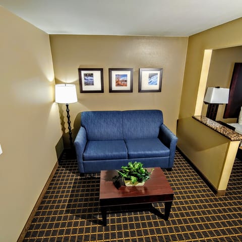 Suite, Multiple Beds, Non Smoking | Living area | 50-inch TV with satellite channels