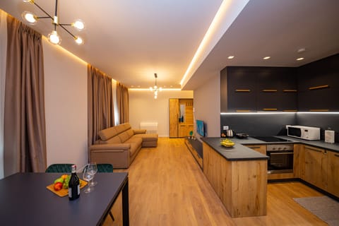 Apartment, 1 Bedroom (2) | Living area | Flat-screen TV