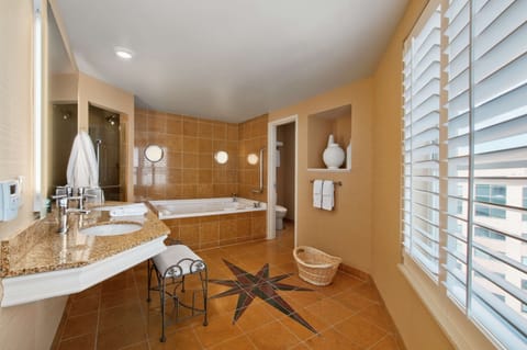 Room, 1 King Bed, Jetted Tub | Bathroom | Combined shower/tub, free toiletries, hair dryer, towels