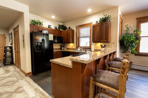 Townhome, 2 Bedrooms | Private kitchen | Oven, toaster, cookware/dishes/utensils