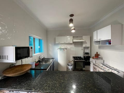 Grand House, 3 Bedrooms | Private kitchen | Full-size fridge, microwave, blender, cleaning supplies