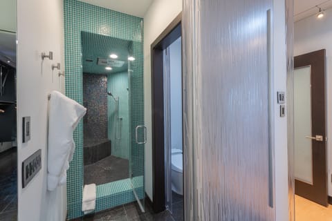 Luxury Condo | Bathroom | Deep soaking tub, hair dryer, bathrobes, towels