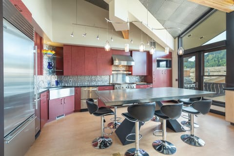 Luxury Condo | Private kitchen | Full-size fridge, microwave, oven, stovetop