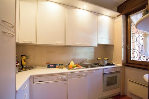 Family Apartment, 2 Bedrooms, Mountainside (Menaggio Poggio Fiorito Loggetta) | Private kitchen | Fridge, microwave, oven, stovetop