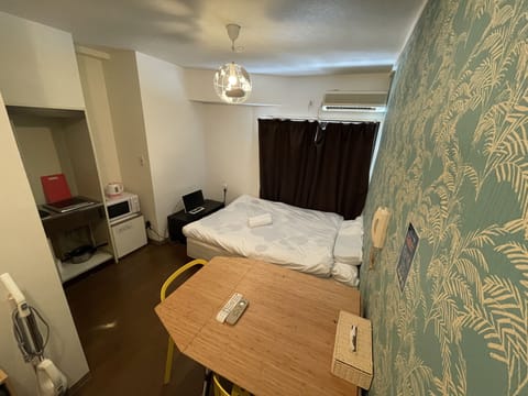 Apartment, Non Smoking | Desk, free WiFi, bed sheets