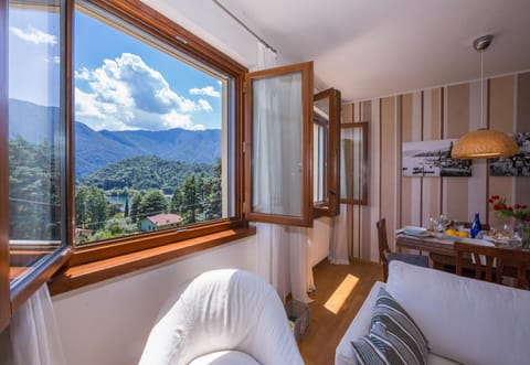 Family Apartment, 3 Bedrooms, 2 Bathrooms, Mountainside (Bellavista Mezzegra) | Living room | Flat-screen TV, DVD player, stereo