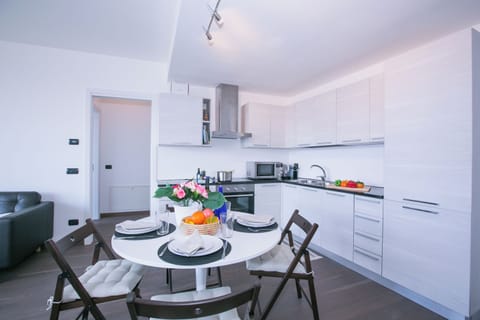 Family Apartment, 2 Bedrooms, Mountainside (Sant' Andrea Giardino) | Dining room