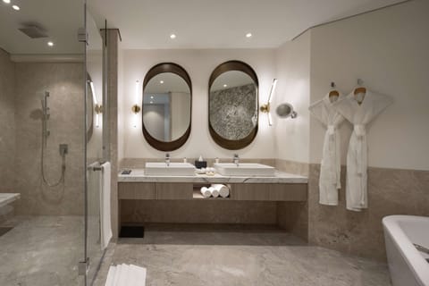 Suite (City Light) | Bathroom | Eco-friendly toiletries, hair dryer, bathrobes, slippers