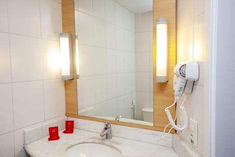 Shower, eco-friendly toiletries, hair dryer, towels