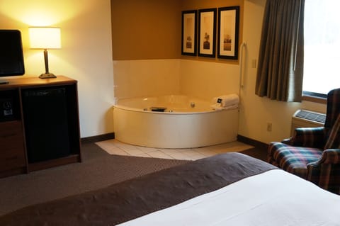 Suite, 1 King Bed, Accessible, Non Smoking | Premium bedding, desk, blackout drapes, iron/ironing board