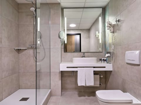 Shower, eco-friendly toiletries, hair dryer, towels