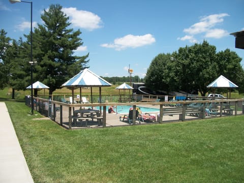 Seasonal outdoor pool, open 9 AM to 10 PM, pool umbrellas, sun loungers