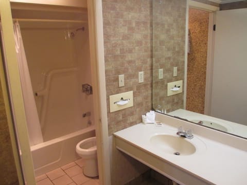 Combined shower/tub, deep soaking tub, free toiletries, hair dryer