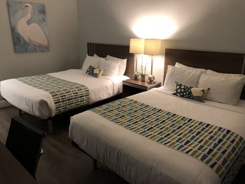 Deluxe Room, 2 Queen Beds | Desk, iron/ironing board, free WiFi, bed sheets