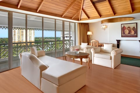 Club Suite, 1 King Bed | Living area | 32-inch LCD TV with satellite channels, TV