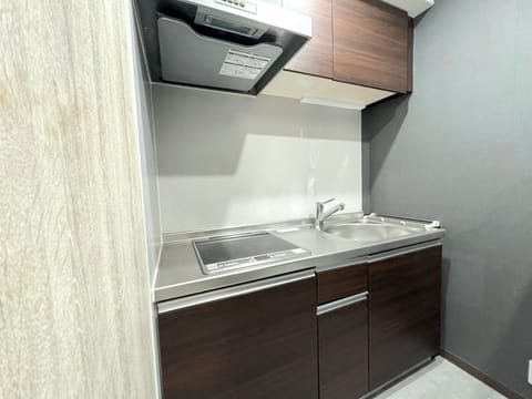 URBAN STAY SHINJUKU EAST102 | Private kitchen | Fridge, microwave, stovetop, electric kettle