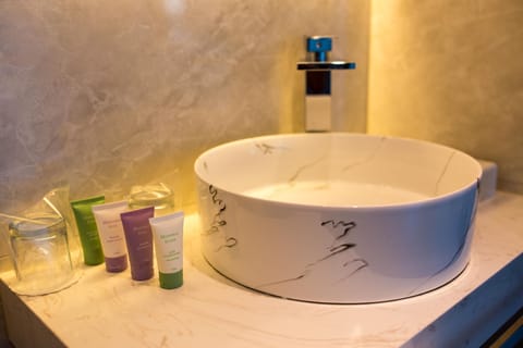 Shower, free toiletries, hair dryer, towels