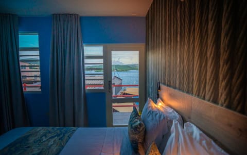 Deluxe Double Room, 1 Queen Bed, Ocean View | Minibar, free WiFi, bed sheets