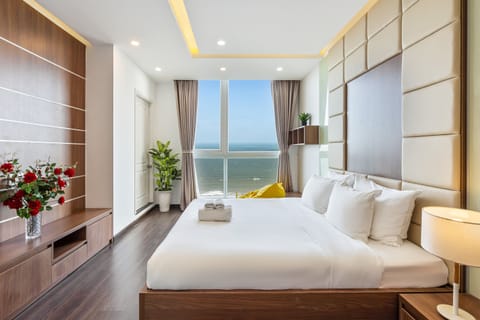 Family Apartment, 3 Bedrooms, Sea View | In-room safe, desk, laptop workspace, blackout drapes