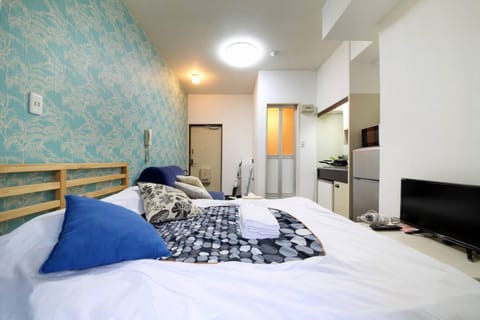 Apartment, Non Smoking | Desk, iron/ironing board, free WiFi, bed sheets