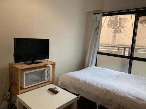 Apartment, Non Smoking | Desk, iron/ironing board, free WiFi, bed sheets