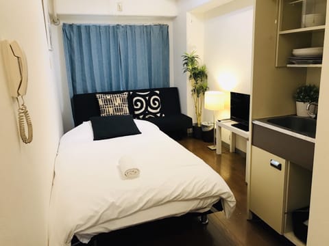 Apartment, Non Smoking | Desk, iron/ironing board, free WiFi, bed sheets