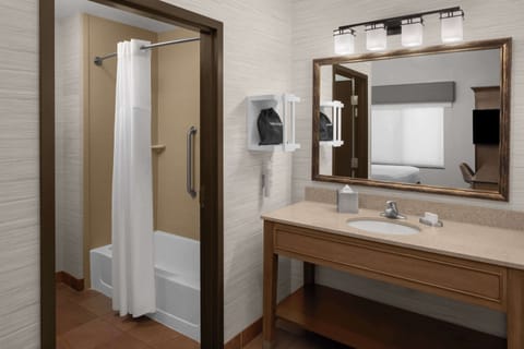 Suite, One King Bed | Bathroom | Hair dryer, towels