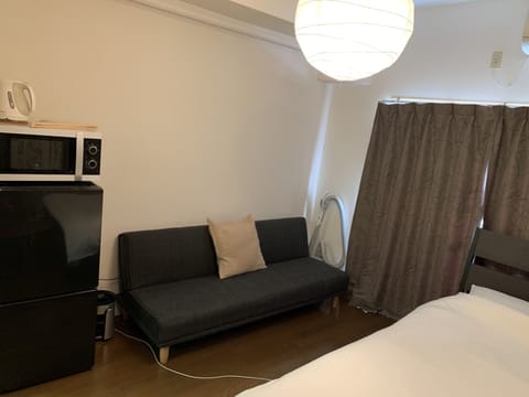 Apartment, Non Smoking | Desk, iron/ironing board, free WiFi, bed sheets