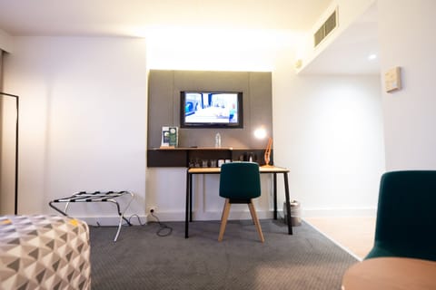 Standard Room, 1 Queen Bed, City View | Minibar, desk, blackout drapes, iron/ironing board