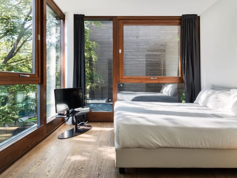 Room Garden View | Premium bedding, blackout drapes, free WiFi, bed sheets