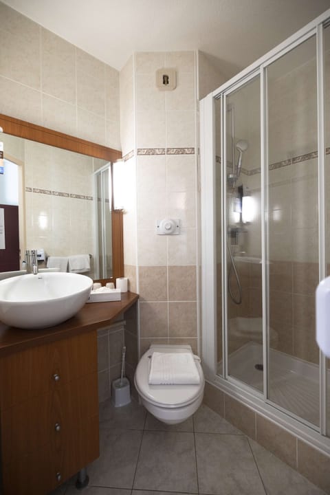 Shower, eco-friendly toiletries, hair dryer, towels