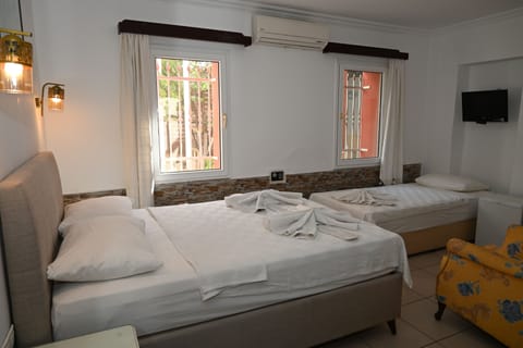 Standard Triple Room | In-room safe, blackout drapes, iron/ironing board, free WiFi