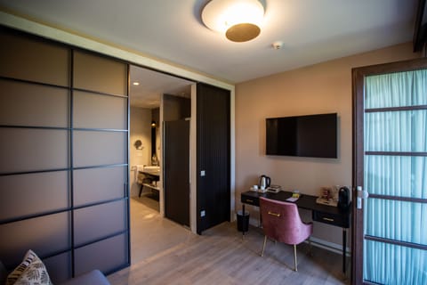 Suite | Living area | 21-inch LCD TV with digital channels, TV