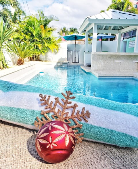 Outdoor pool, pool umbrellas, sun loungers