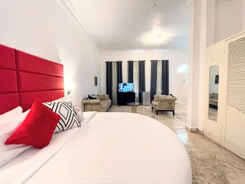 Junior Suite, 1 King Bed | Premium bedding, in-room safe, individually decorated