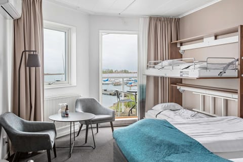Family Room, 1 King Bed, Terrace, Sea View (with Sofabed) | Minibar, in-room safe, desk, iron/ironing board