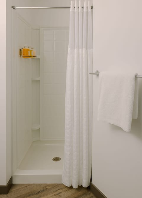 Apartment, 1 Bedroom | Bathroom | Shower, designer toiletries, hair dryer, towels