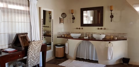 Standard Double Room, 1 Double Bed (Main Olarro Double) | Bathroom | Rainfall showerhead, eco-friendly toiletries, hair dryer, bathrobes