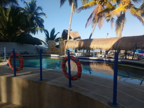 Outdoor pool, open 9 AM to 9 PM, sun loungers