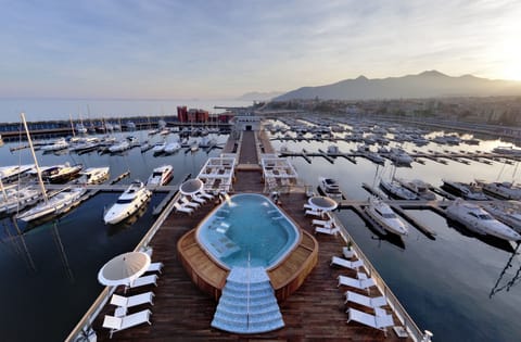 Seasonal outdoor pool, pool umbrellas, sun loungers