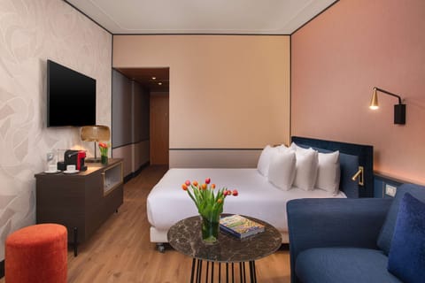 Down comforters, minibar, in-room safe, desk