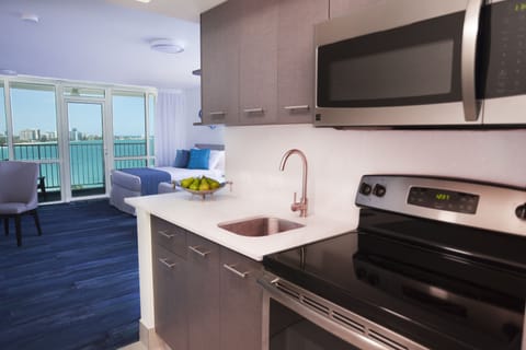 Deluxe Studio, Ocean View | Private kitchen | Fridge, microwave, oven, stovetop