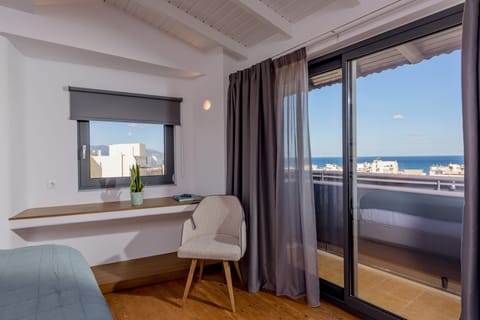 Junior Studio Suite, Sea View | Desk, iron/ironing board, free WiFi, bed sheets