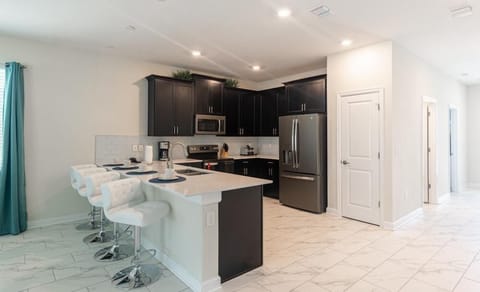 House, Multiple Beds (820DSD - The Retreat at ChampionsGate) | Private kitchen