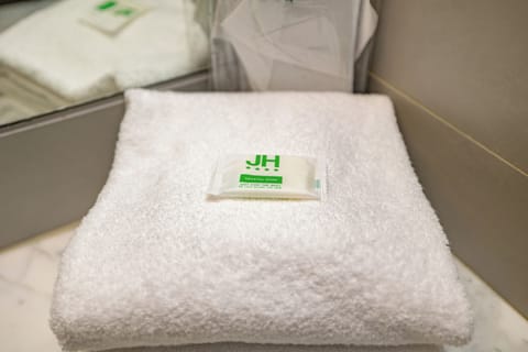 Shower, free toiletries, hair dryer, slippers