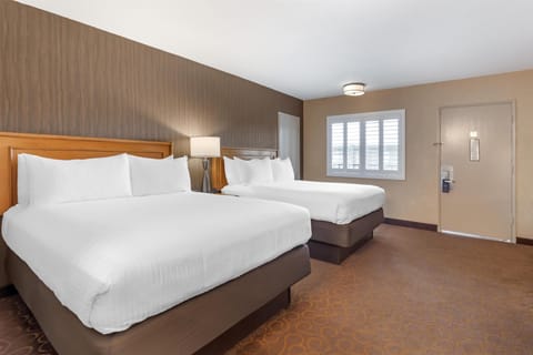 Room, 2 Queen Beds | Desk, laptop workspace, iron/ironing board, free cribs/infant beds